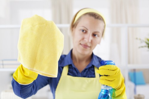Cleaner inspecting vacuum equipment and cable safety before use