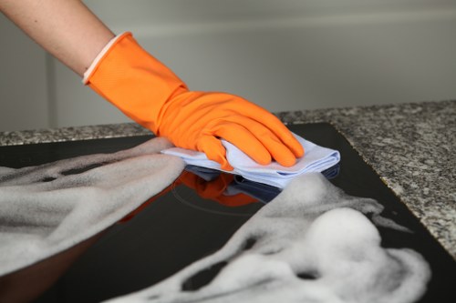 Cleaner treating a high-traffic carpeted corridor in a Twickenham business property
