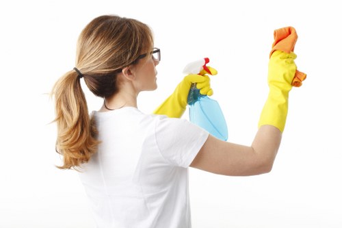 Professional cleaner maintaining a safe and tidy work area